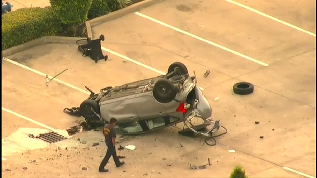 Car flipped into restaurant parking lot along SW Freeway feeder at Kirby    