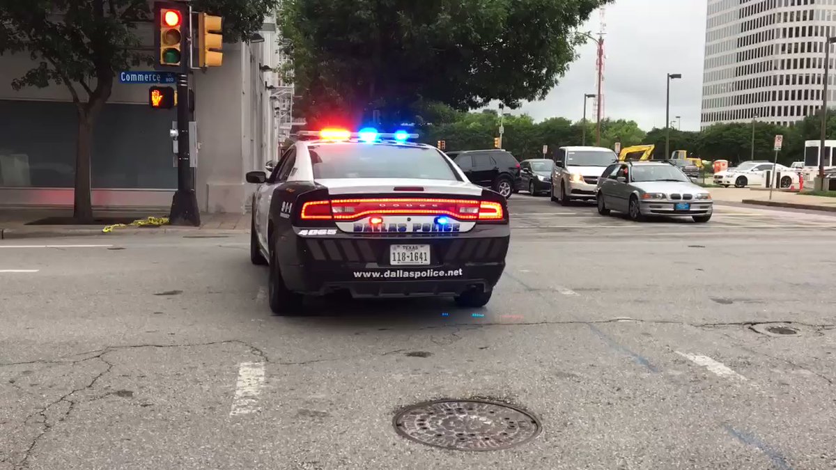 Police perimeter expanded further around federal courthouse. Suspicious vehicle left near courthouse.    