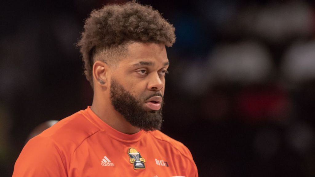 Dallas police say one man has been arrested and a second suspect was being sought in last month’s slaying of former NBA and Texas Tech standout Andre Emmett.