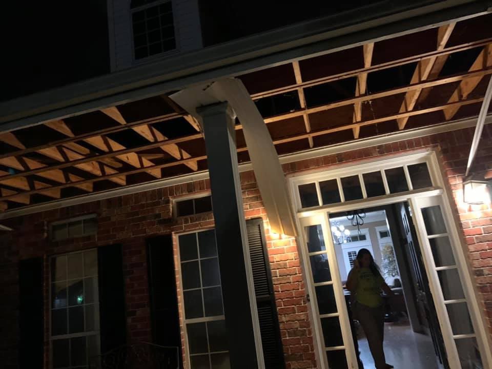 Here is the house damage. Both garage doors are sucked in as well. 