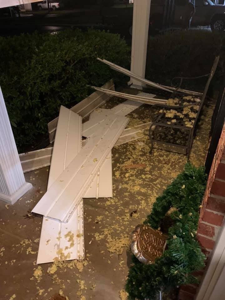 Here is the house damage. Both garage doors are sucked in as well. 