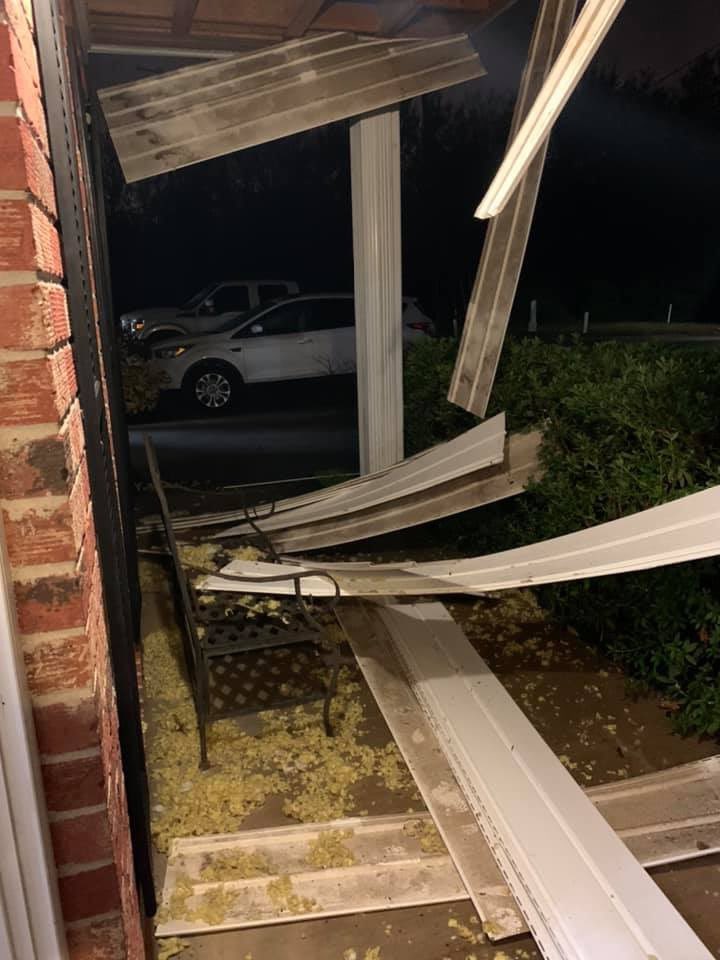 Here is the house damage. Both garage doors are sucked in as well. 