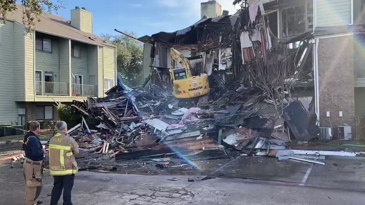 Ccrews are tearing down Dallas condos that were destroyed by a fire overnight. About 30 units have been impacted.