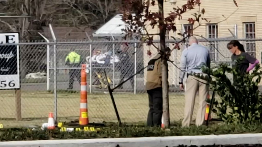 Two people were wounded Thursday morning, including a man who was shooting at a woman, police said.