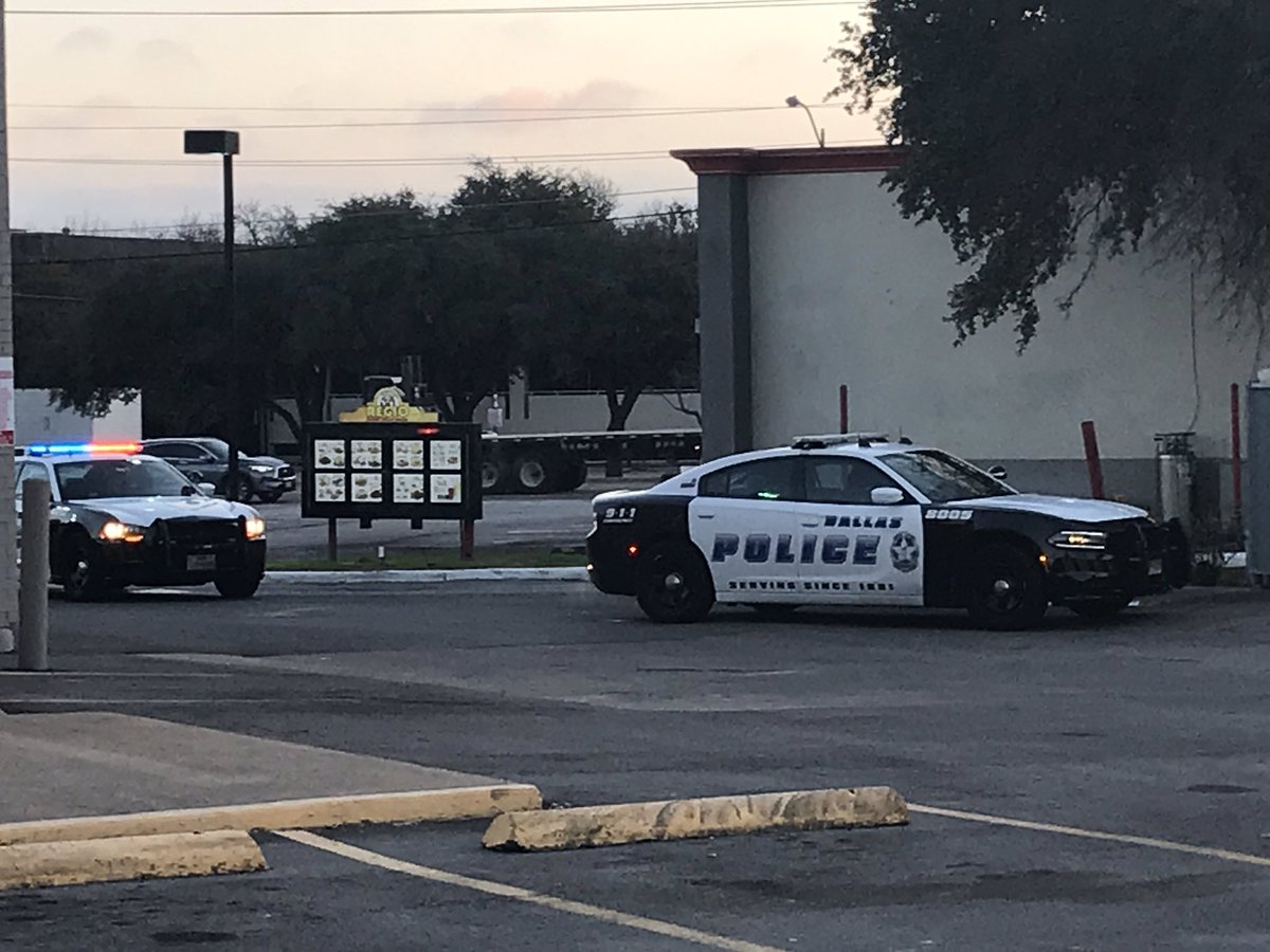 Dallas police and a detective   on scene investigating an unexplained death at a fast food restaurant. A body was found in the drive thru