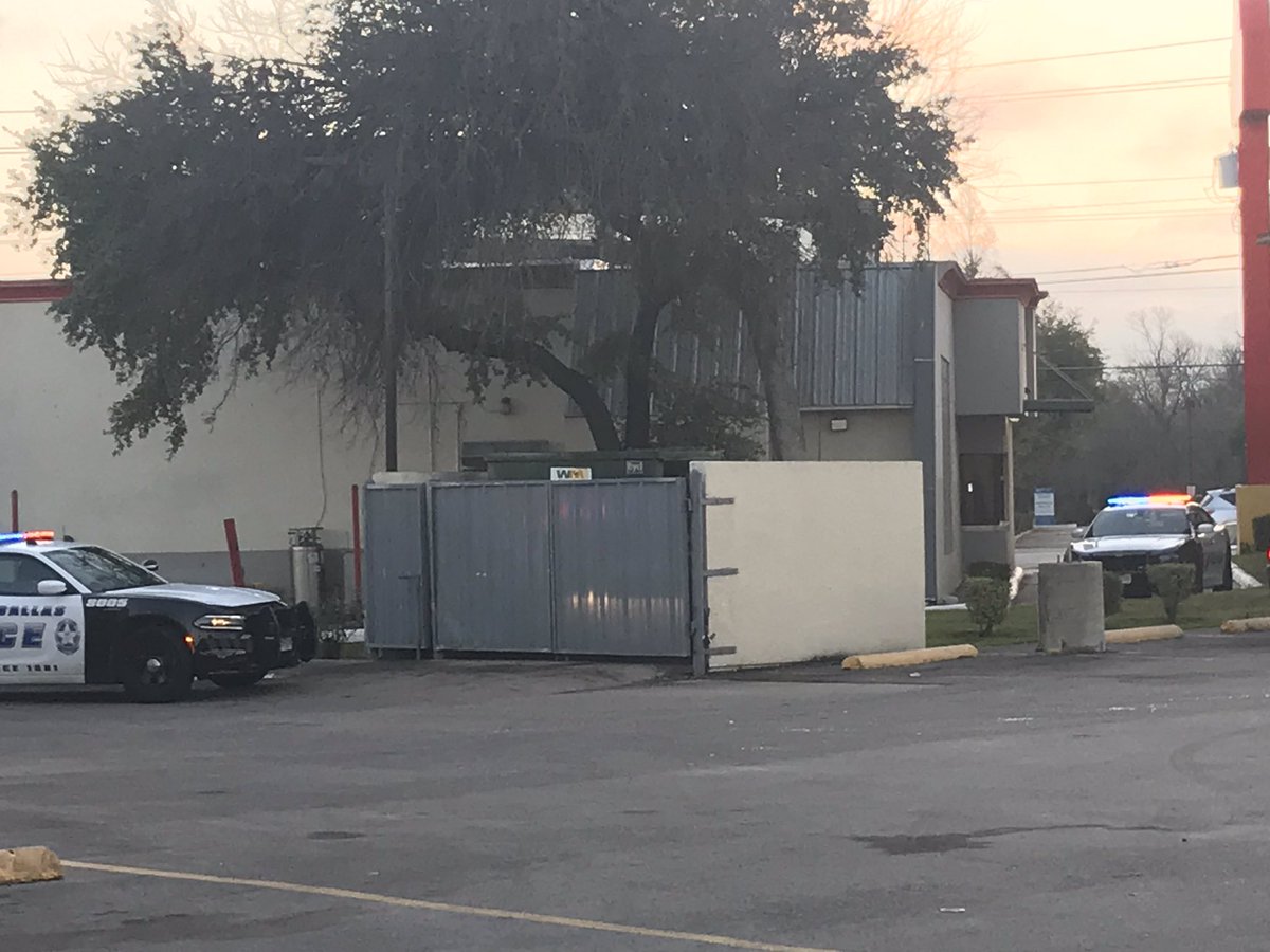Dallas police and a detective   on scene investigating an unexplained death at a fast food restaurant. A body was found in the drive thru