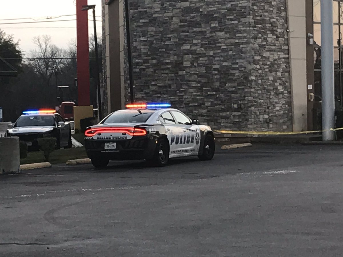 Dallas police and a detective   on scene investigating an unexplained death at a fast food restaurant. A body was found in the drive thru