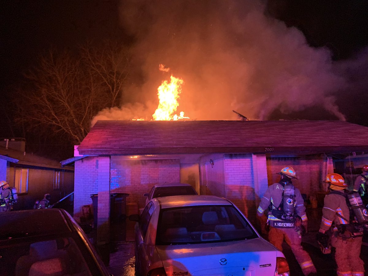 2009 Iroquois, fire through roof on arrival. Fire has been contained to duplex of origin. 5 adults will be displaced