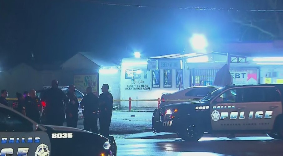 Suspects fire at officers while driving away from shooting in Dallas. Police did not say if the person who was detained faced any charges.