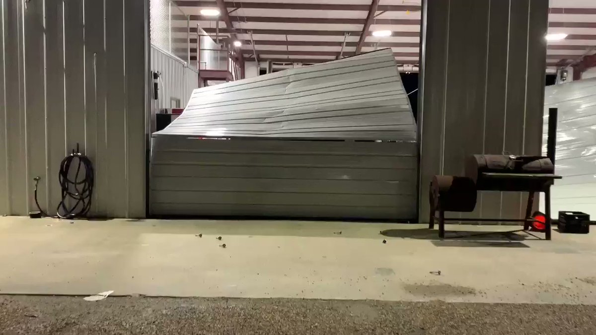 Strong winds blew in the barn doors of the Johnson County Precinct One workshop.W