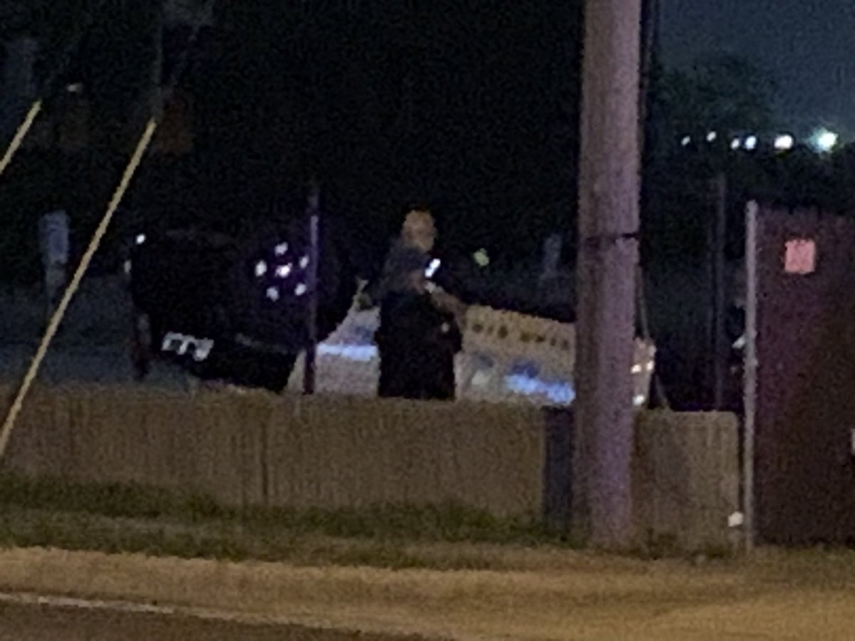 Camp Wisdom at S Polk closed after a Dallas police officer is injured in a rollover crash