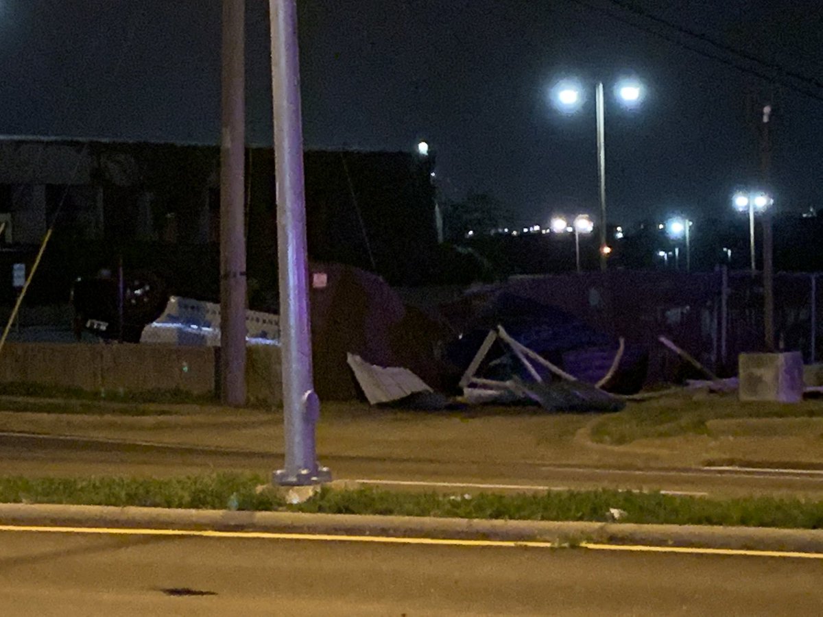 Camp Wisdom at S Polk closed after a Dallas police officer is injured in a rollover crash