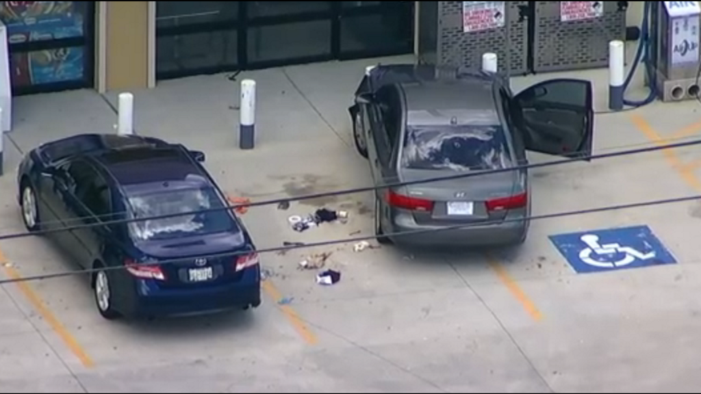 Officer opens fire after stolen vehicle suspect hits him at the Shell in the 17300 block of the Northwest Freeway.