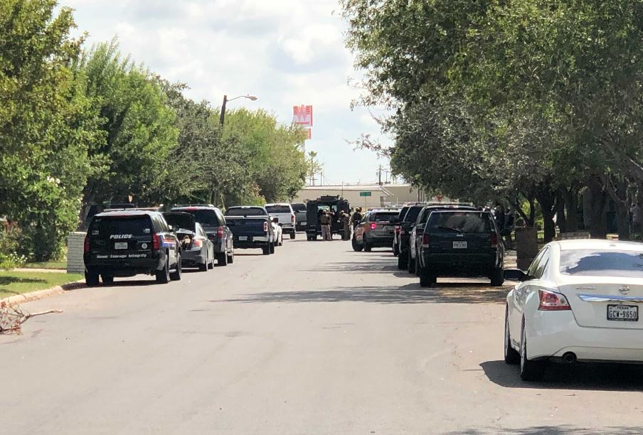 Law enforcement is at the scene of a home in Harlingen where a man has barricaded himself