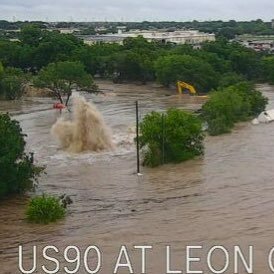 Leon Creek and Highway 90. It looks like flood waters caused a sinkhole to open up on a construction site.