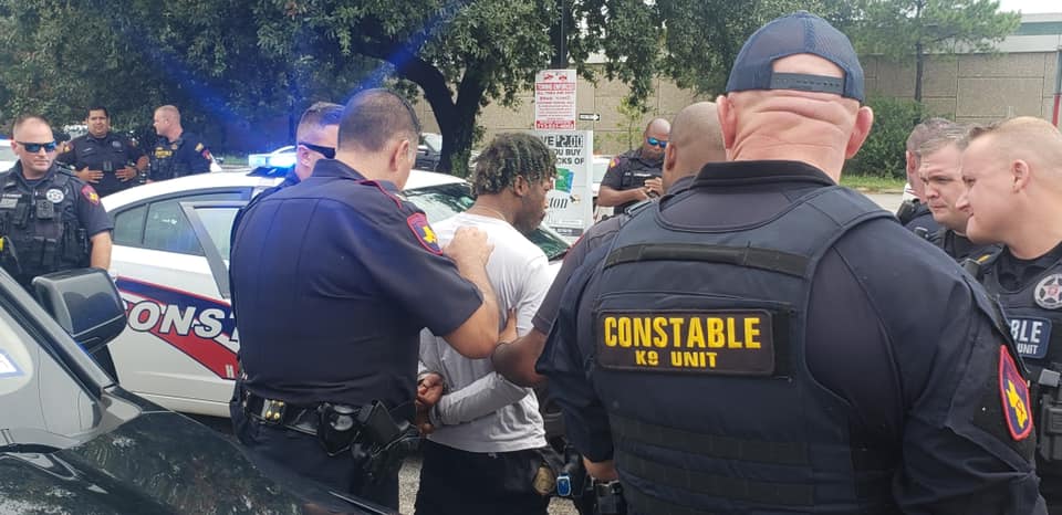 Heavy police presence at the Flying J - 15919 North Freeway.   After reports that the Walgreens located at Cypresswood / North Freeway was robbed for their cash, Constables were able to locate the suspect vehicle and apprehended both suspects after a brief pursuit