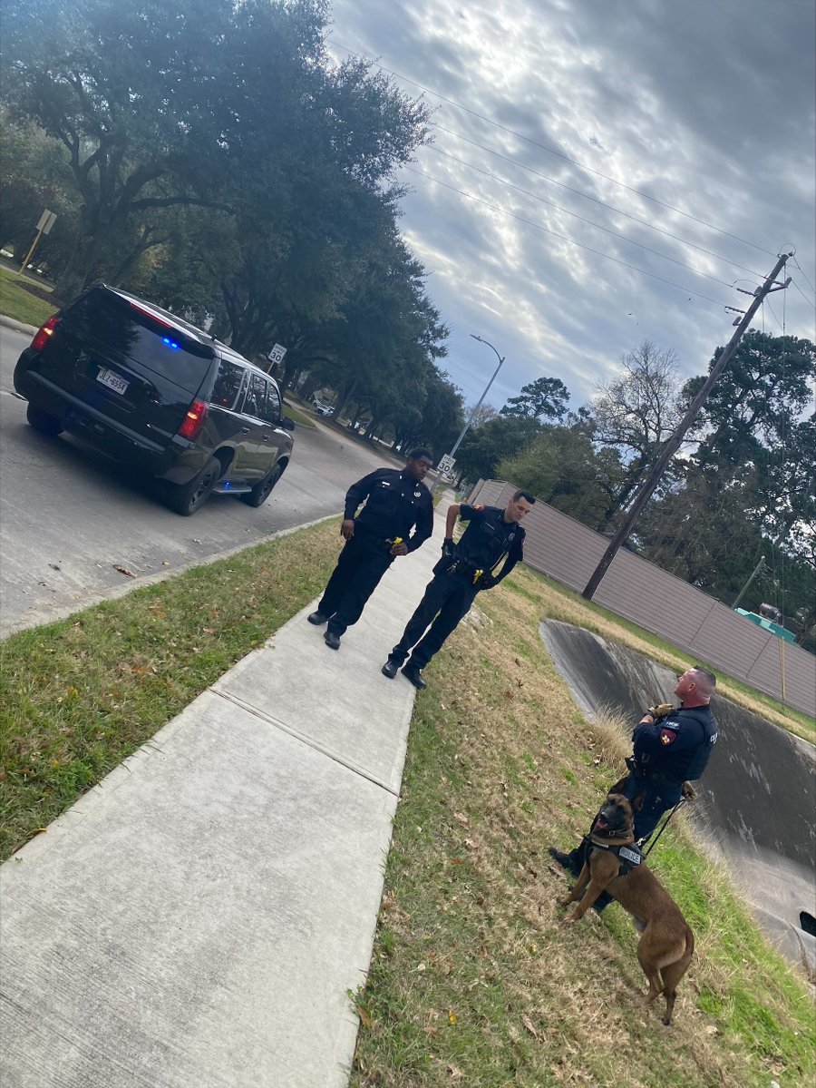 Heavy police presence in the 5400 block of Mossy Timbers Drive.   Constable Deputies are searching for yesterday's barricaded suspect, who is described as a white male wearing black sweater with white dots.