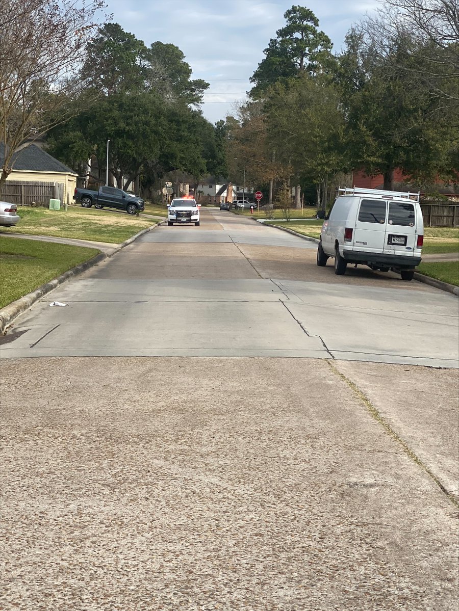 Heavy police presence in the 5400 block of Mossy Timbers Drive.   Constable Deputies are searching for yesterday's barricaded suspect, who is described as a white male wearing black sweater with white dots.   