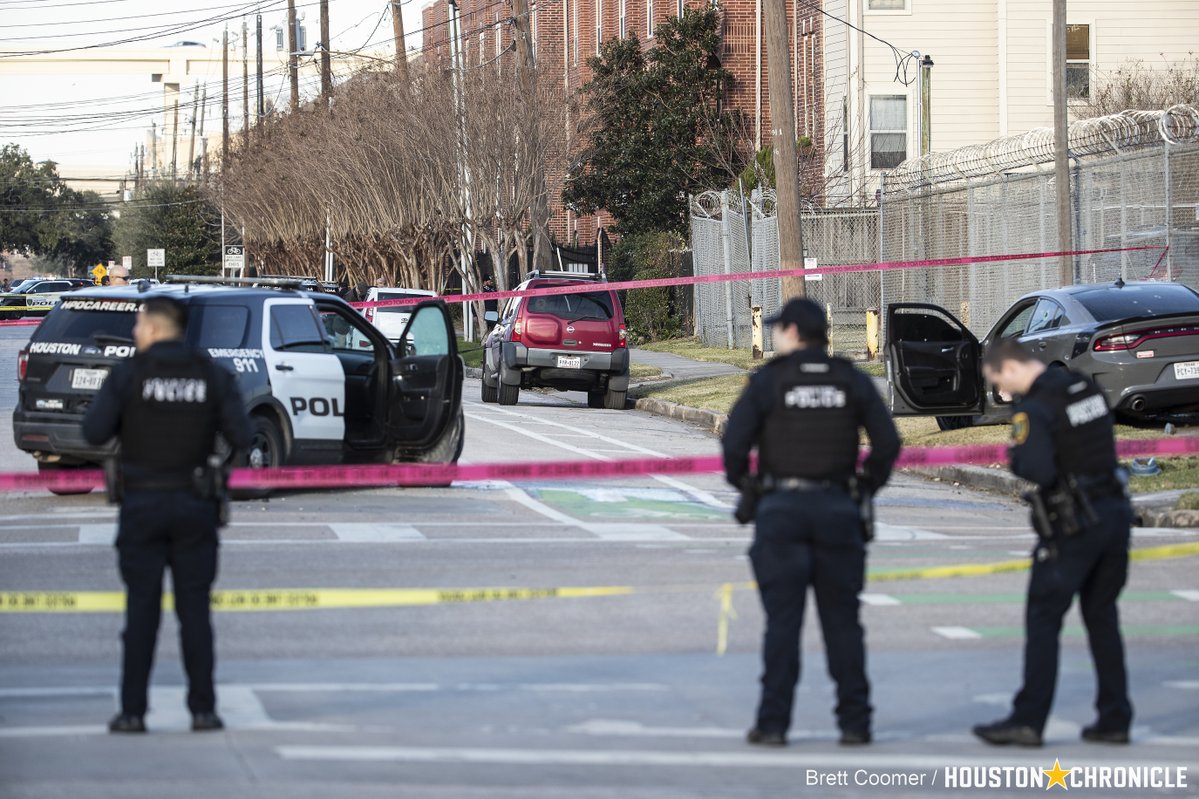 Houston police investigate the scene where 3 Houston police officers were shot after responding to a call for a disturbance. HPD Chief Troy Finner said the suspect fired at the officers with what appeared to be an automatic weapon houstonchronicle