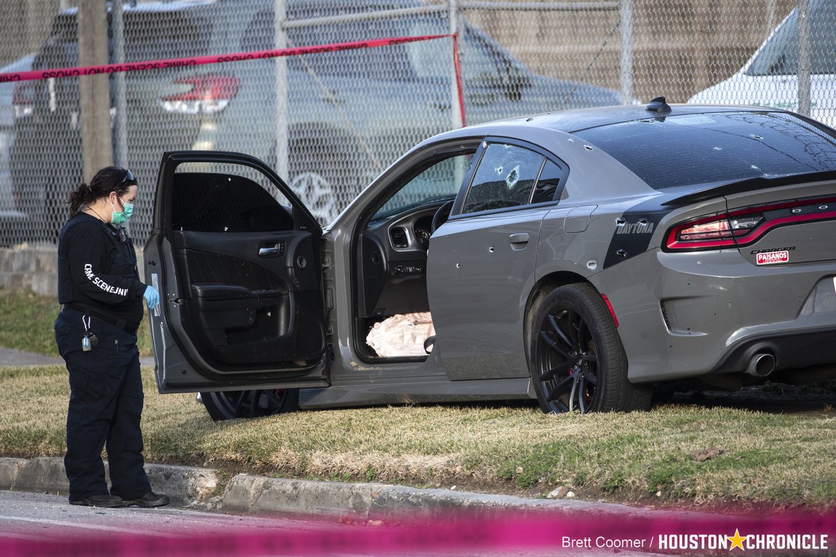 Houston police investigate the scene where 3 Houston police officers were shot after responding to a call for a disturbance. HPD Chief Troy Finner said the suspect fired at the officers with what appeared to be an automatic weapon houstonchronicle