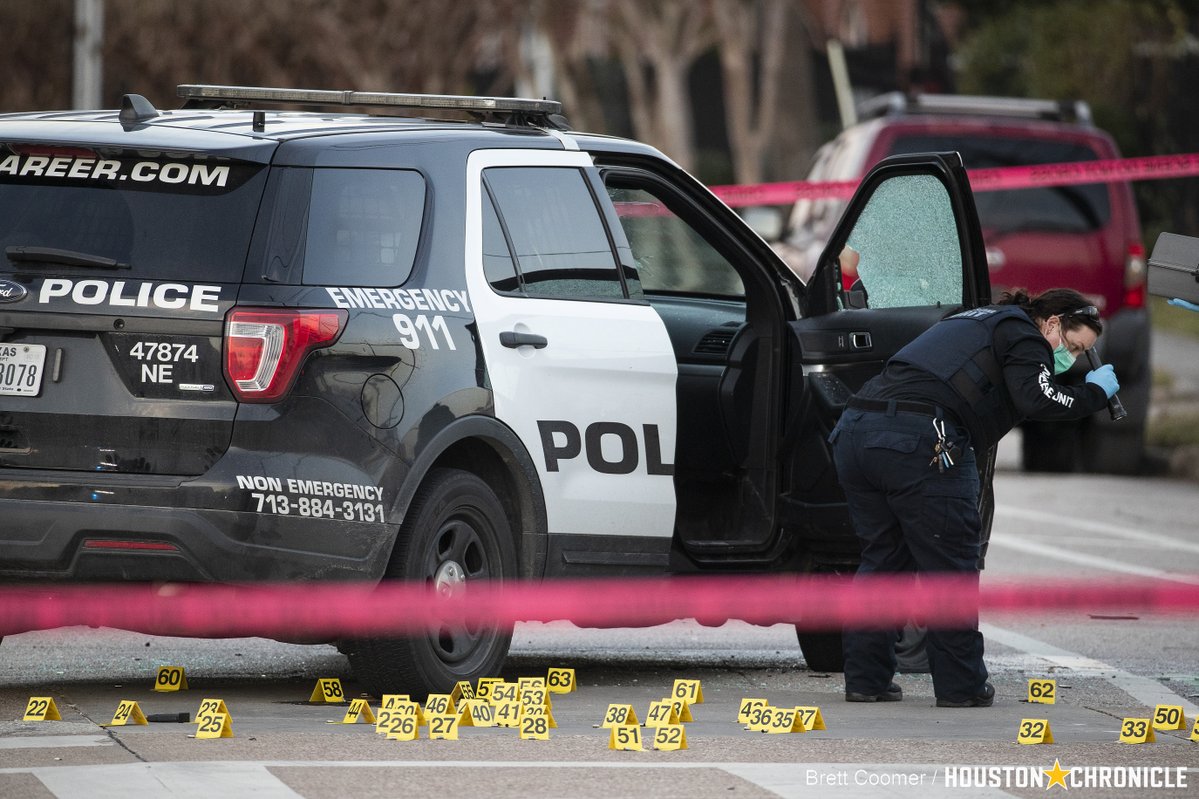 Houston police investigate the scene where 3 Houston police officers were shot after responding to a call for a disturbance. HPD Chief Troy Finner said the suspect fired at the officers with what appeared to be an automatic weapon houstonchronicle