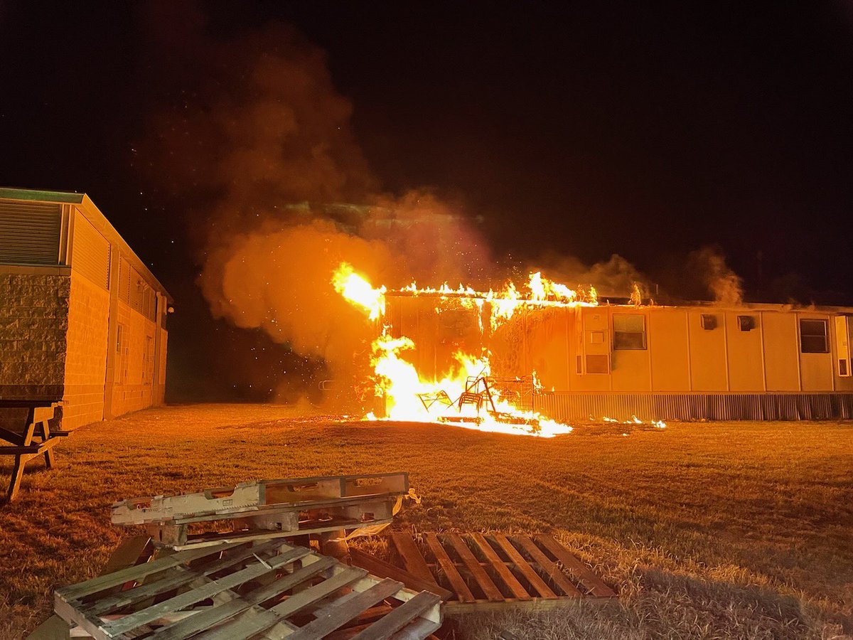 Arrival conditions for overnight fire at McBee Elementary. Fire originated in shed and extended to portable classroom. Cause ruled incendiary.  $50k structure $10k content damage