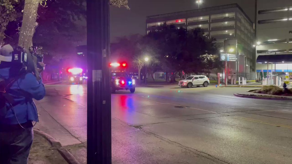 Two ambulances escorted by several Harris Co. deputies now arriving at Memorial Hermann hospital.