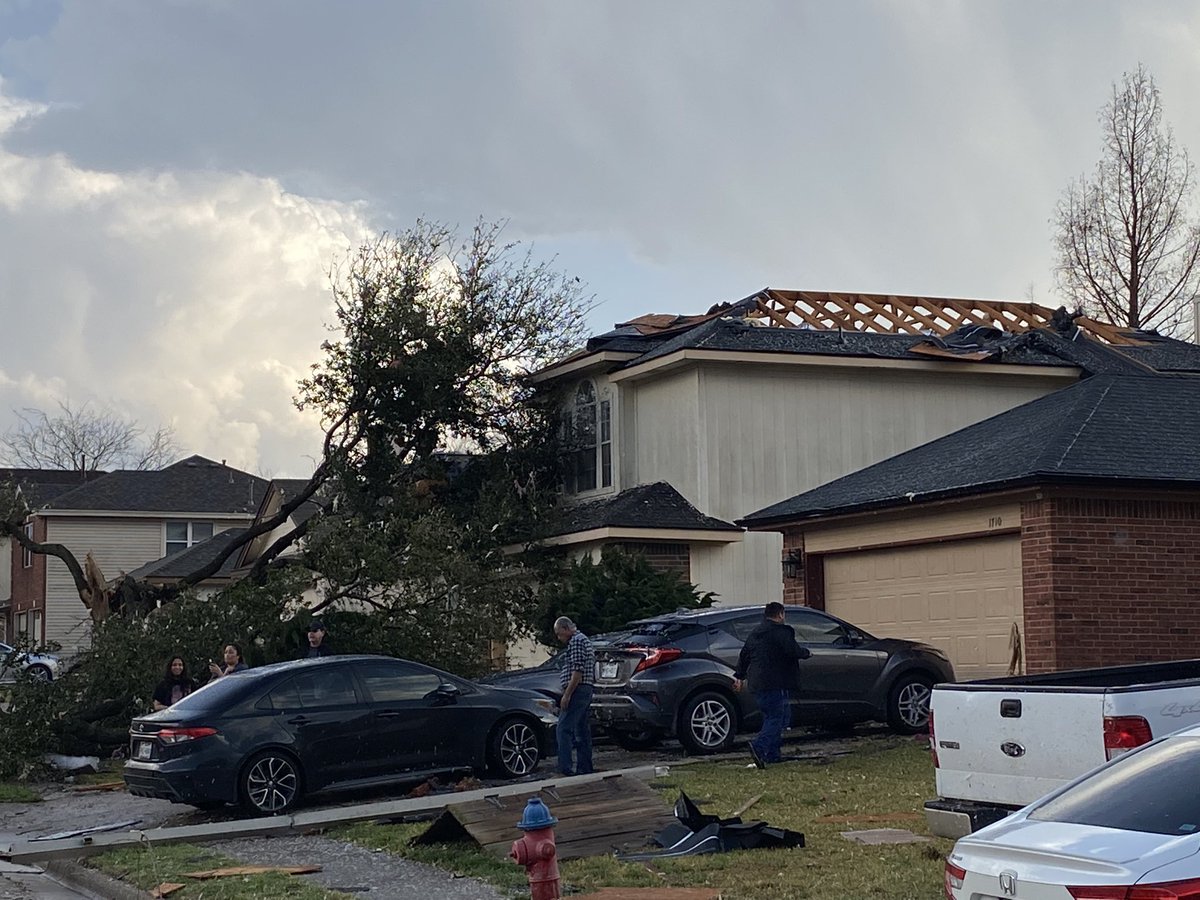 Scene in Round Rock a few hours ago. Residents on Southwestern Trail calling it total destruction after tornado touched down. Roofs ripped off, trees split in half, and debris strewn everywhere. Everyone here is okay as far as we can tell.