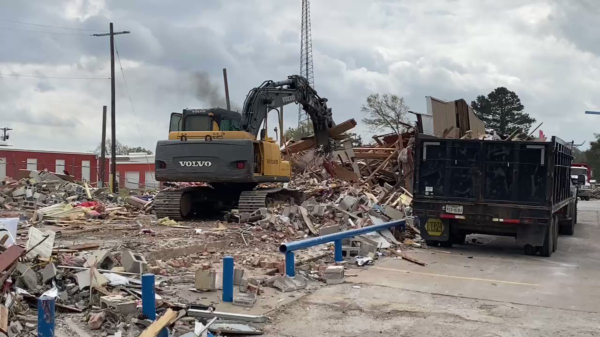 Demo continues one week after a tornado struck part of Crockett, TX. The storm totaled this convenience store and a number of nearby homes.