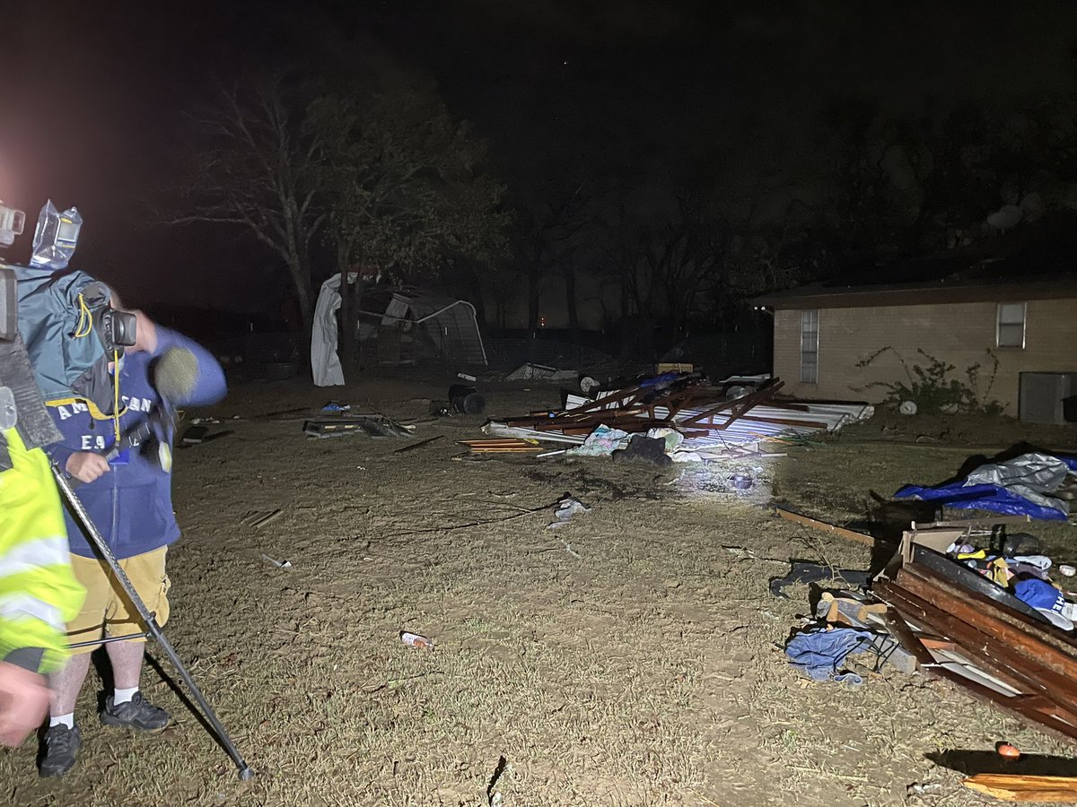 Joshua near Egan where tornado debris showed up on radar earlier tonight.   Lots of damage here. Downed power lines, trees blown over, and debris everywhere.   