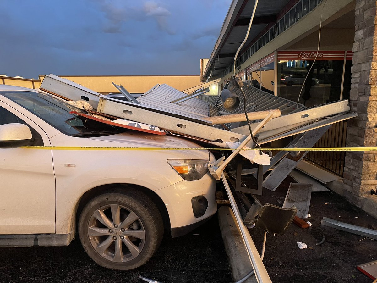 Storm damage in Ennis at Dairy Queen.   general manager said about 10 people were inside, no one was injured.  Side of the building and some customer cars are damaged.  GM told this is the 2nd storm they've experienced damage