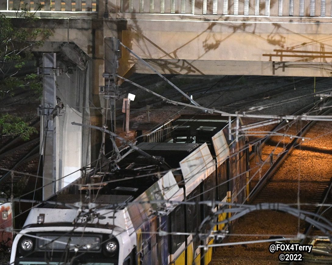 A car plunges off the Houston Street Viaduct. As it falls the car takes down the catenary, the power lines that run DART trains. DART officials say it could take days to repair the damage.