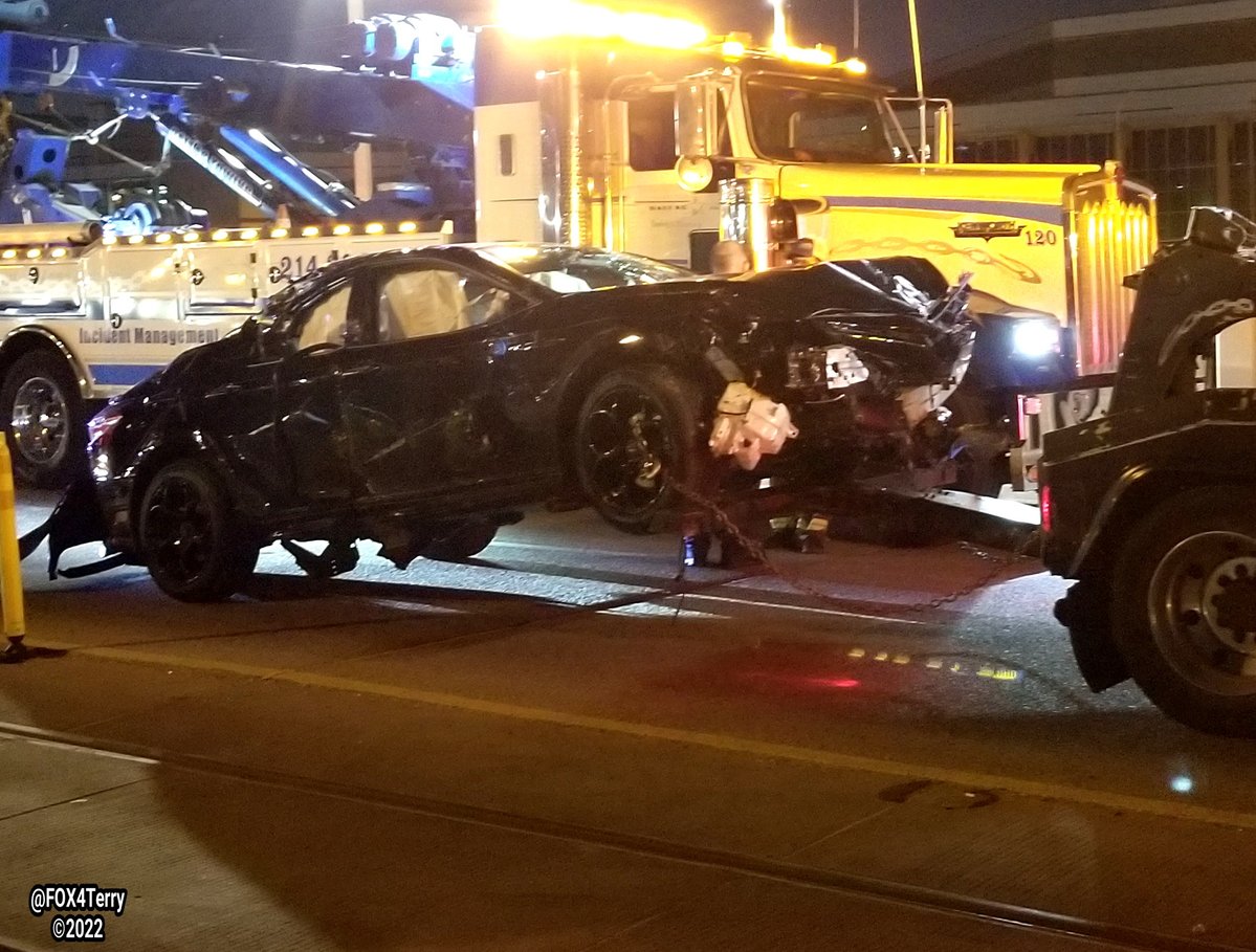 A car plunges off the Houston Street Viaduct. As it falls the car takes down the catenary, the power lines that run DART trains. DART officials say it could take days to repair the damage.