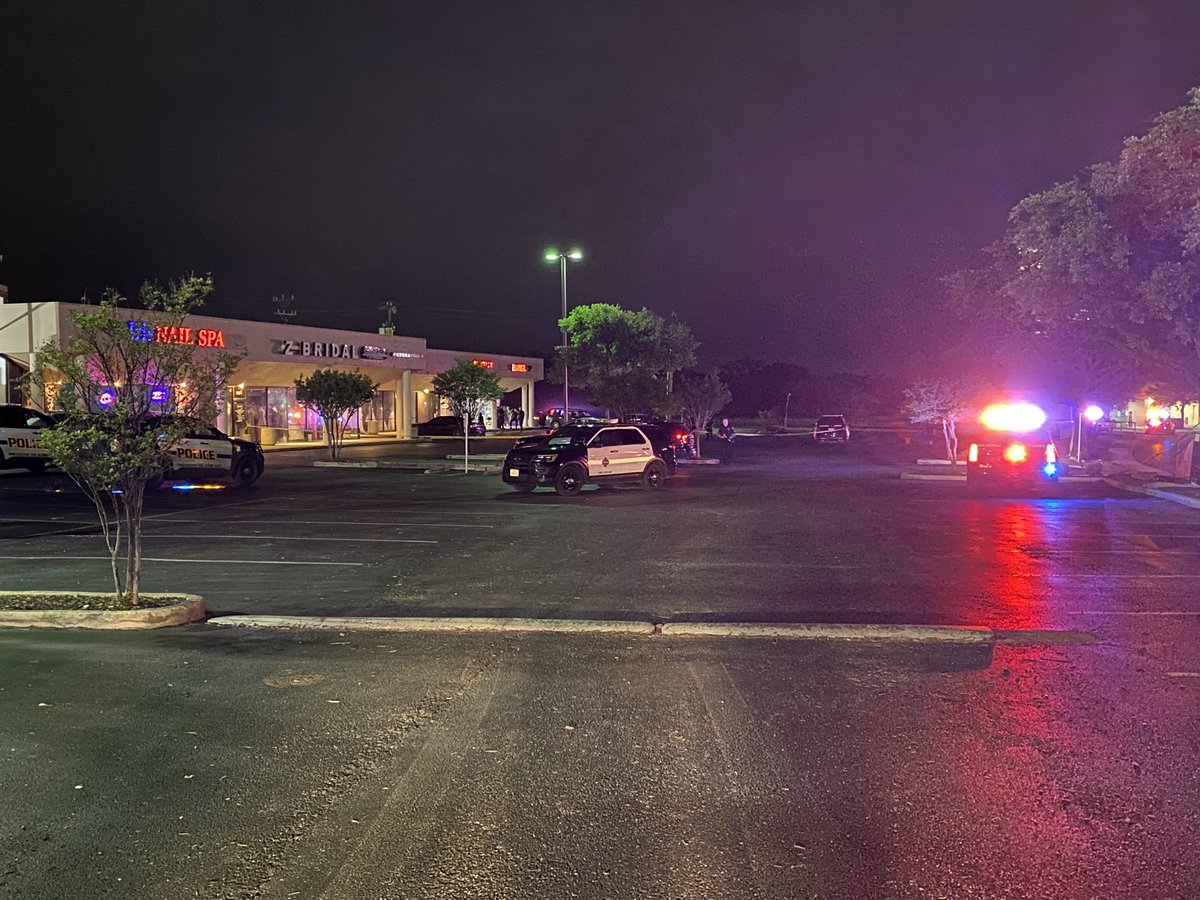 San Antonio police have a large crime scene set up at a strip mall on Wurzbach Road near Ingram Park Mall.  A detective tells three people were shot when a car drove by around 2am