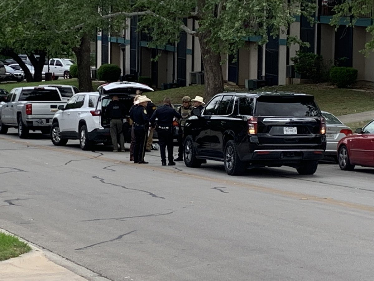 SWAT and other specialty units working for a peaceful resolution with a barricaded person  