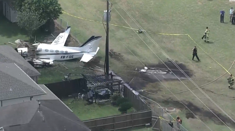 Small plane crash lands in someone's backyard - @khou chopper over the plane had just taken off from hobby airport