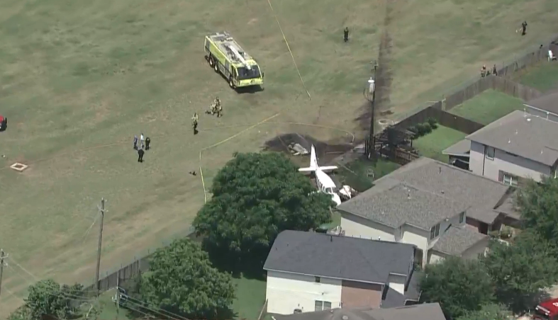 Small plane crash lands in someone's backyard - @khou chopper over the plane had just taken off from hobby airport