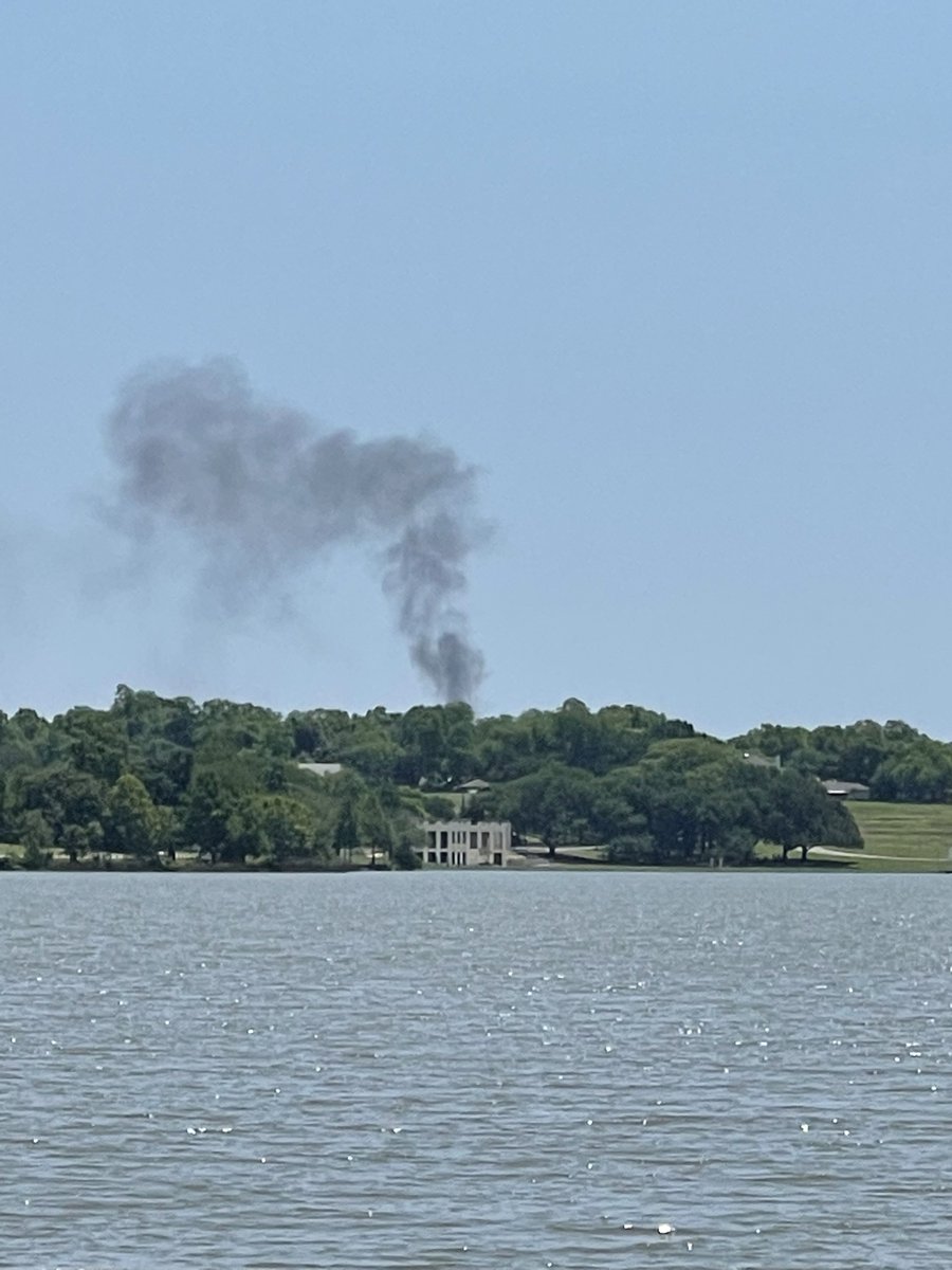 Lots of smoke coming from the bath house cultural center at white rock lake