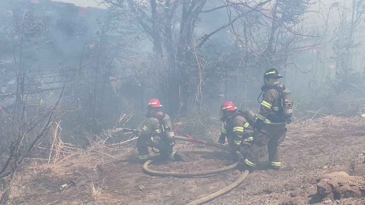 El Paso fire crews working to put off the recycling plant fire in south-central El Paso.