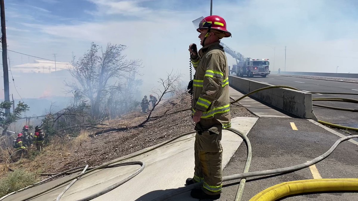 El Paso fire crews working to put off a firefire at a recycling plant in south-central El Paso.