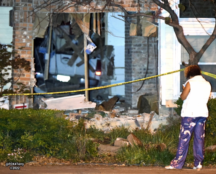 A resident inside his Bryan Place home escapes injury as a pickup drives down his hallway. The truck entered the front of the home destroying the living room, bathroom and bedroom before crashing through the rear wall. 