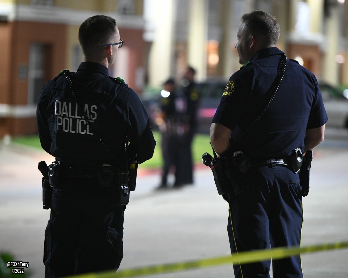 A man is robbed and shot in a motel parking near the High-5. Dallas police are searching for a shooter