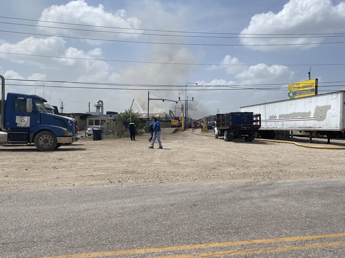 Fire at what appears to be a receiving company off Holmes Road near 288 and 610, south of NRG. Metals may be included in pile of trash. Parts of Holmes Rd is shutdown.