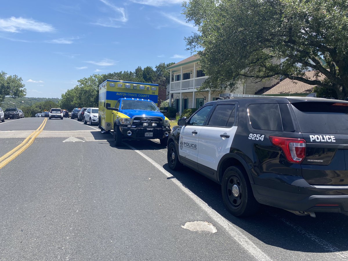 Police are investigating a shooting in northwest Austin on Bluegrass Drive off 360. The two story white house is not where the shooting happened but this is where the police line starts