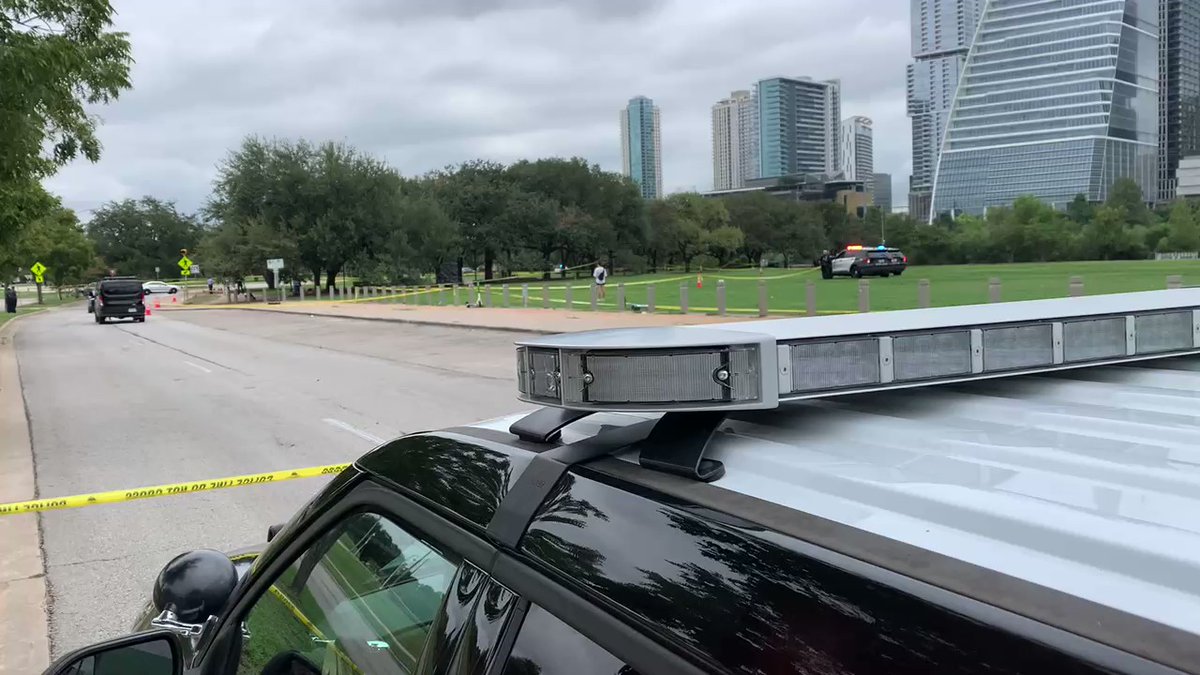 Austin police say they have a person of interest in custody as they investigate the death of a man found with head trauma at Mathis/Auditorium Shores Park near the Stevie Ray Vaughan statue