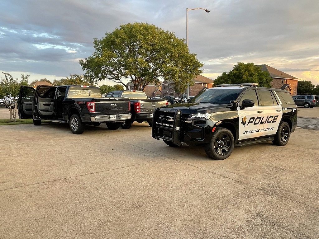 Two arrests were made and firearms were discovered after a pursuit of a stolen truck came to an end in College Station