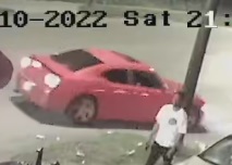 Houston Police:: Surveillance photos of the wanted suspect vehicle, a red Dodge Charger with a sunroof.