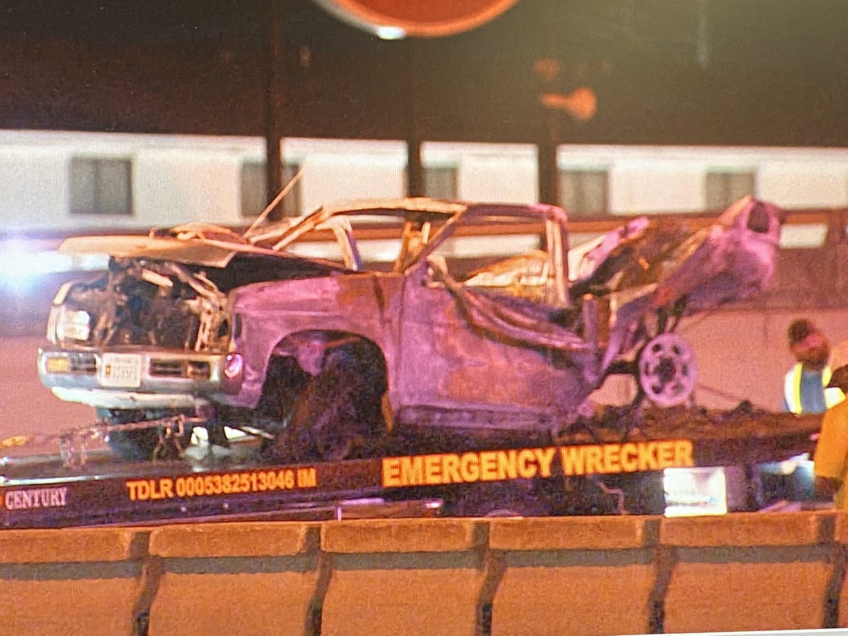 An off duty Dallas officer jumps in to action and pulls a woman from her crashed truck moments before it catches fire along eastbound RLT in Dallas. Dallas County Sheriff deputies investigating