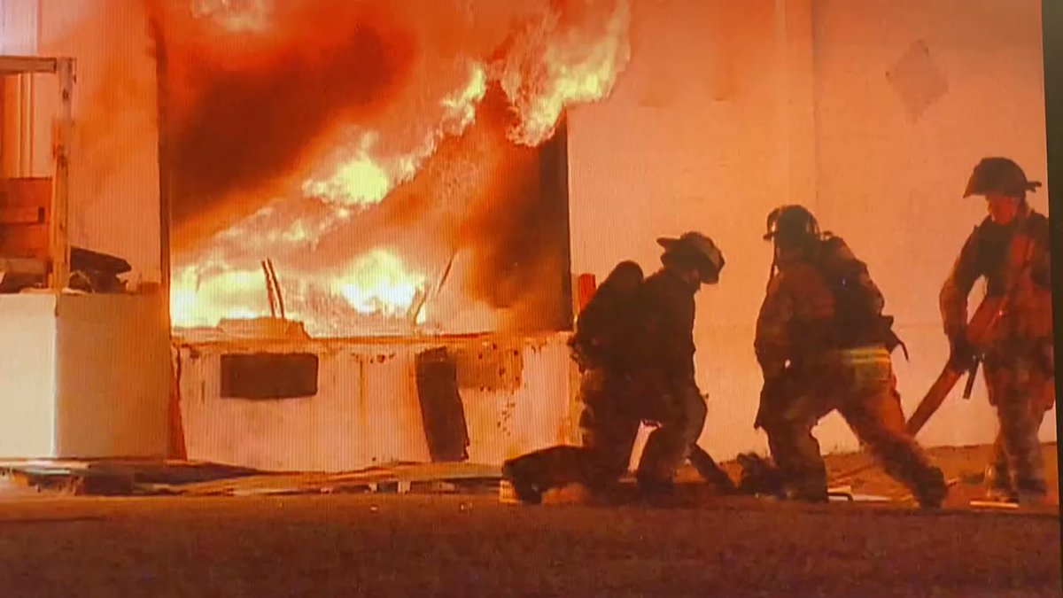 Watch as Fort Worth firefighters prepare to extinguish this 3 alarm blaze. Just a few feet away heavy fire and heat roll out the door