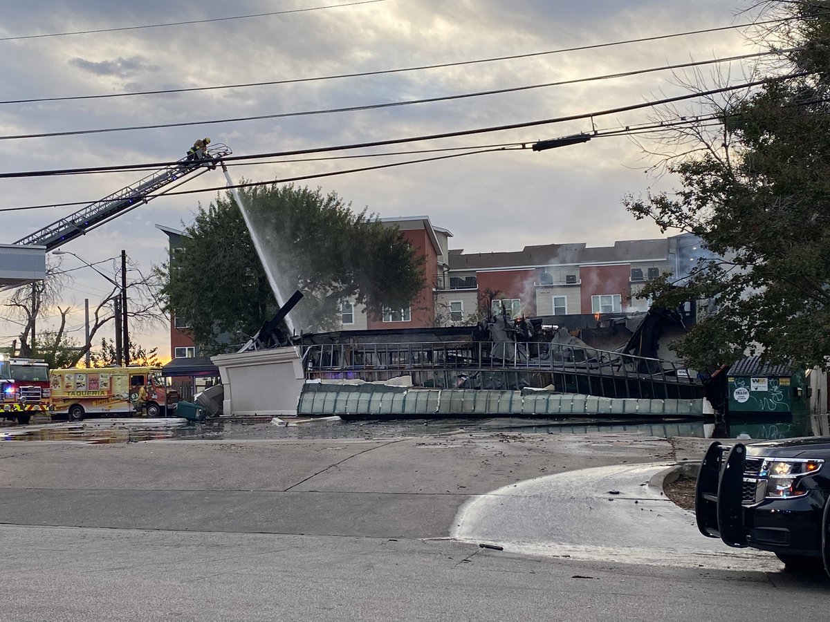 The Austin Fire Department crews continue to work on fully extinguishing a fire at a gas station convenience store in south